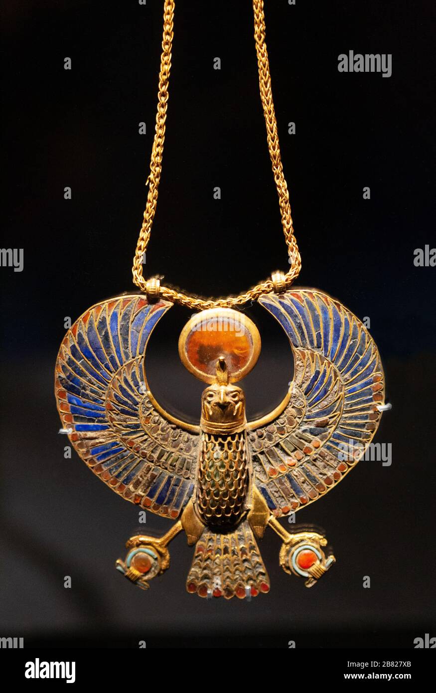 Tutankhamun treasures; Gold inlaid falcon chest pendant with gold chain jewellery from Tutankhamuns tomb, ancient Egyptian history Stock Photo