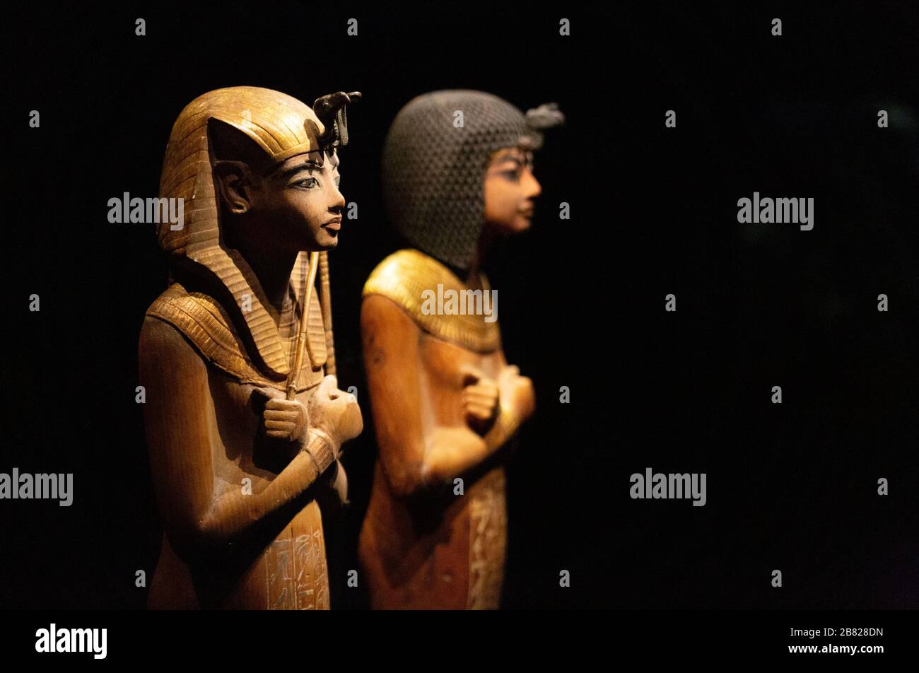Tutankhamun tomb treasures; painted wooden shabtis, or figurines wearing Nemes Headdress and Nubian Wig, from Ancient Egypt Stock Photo