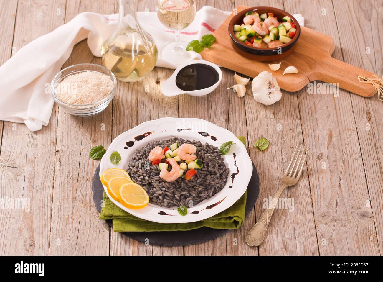 Squid ink risotto Stock Photo - Alamy