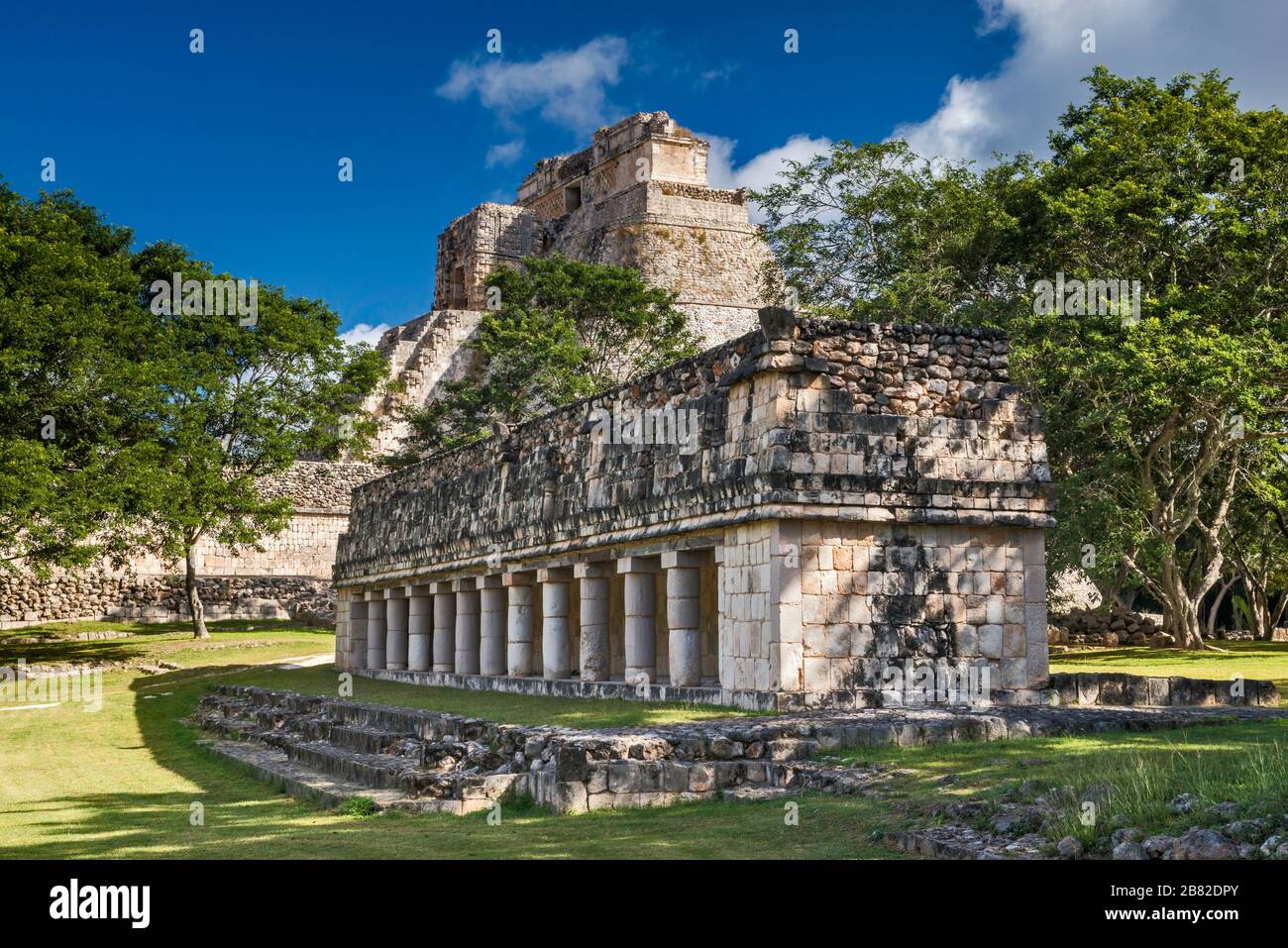 Edificio de las Columnas near Piramide del Adivino (Magicians House), Maya ruins at Uxmal archaeological site, Yucatan Peninsula, Mexico Stock Photo