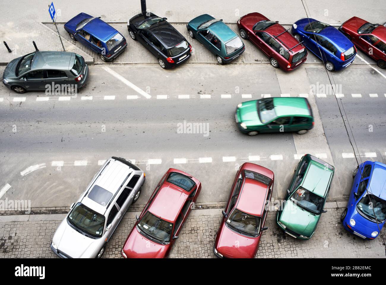 Warsaw, Poland 04-17-2013 cars parking in a small one way street Stock Photo