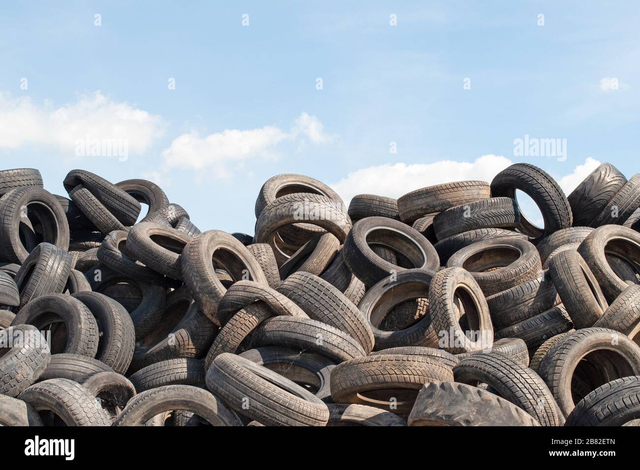 Old car tires for recycling Stock Photo Alamy