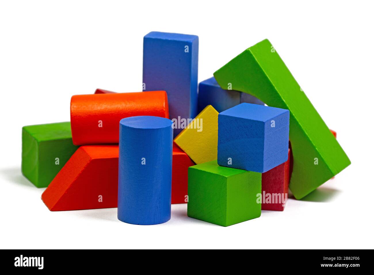 Colorful wooden toy blocks against white background Stock Photo - Alamy