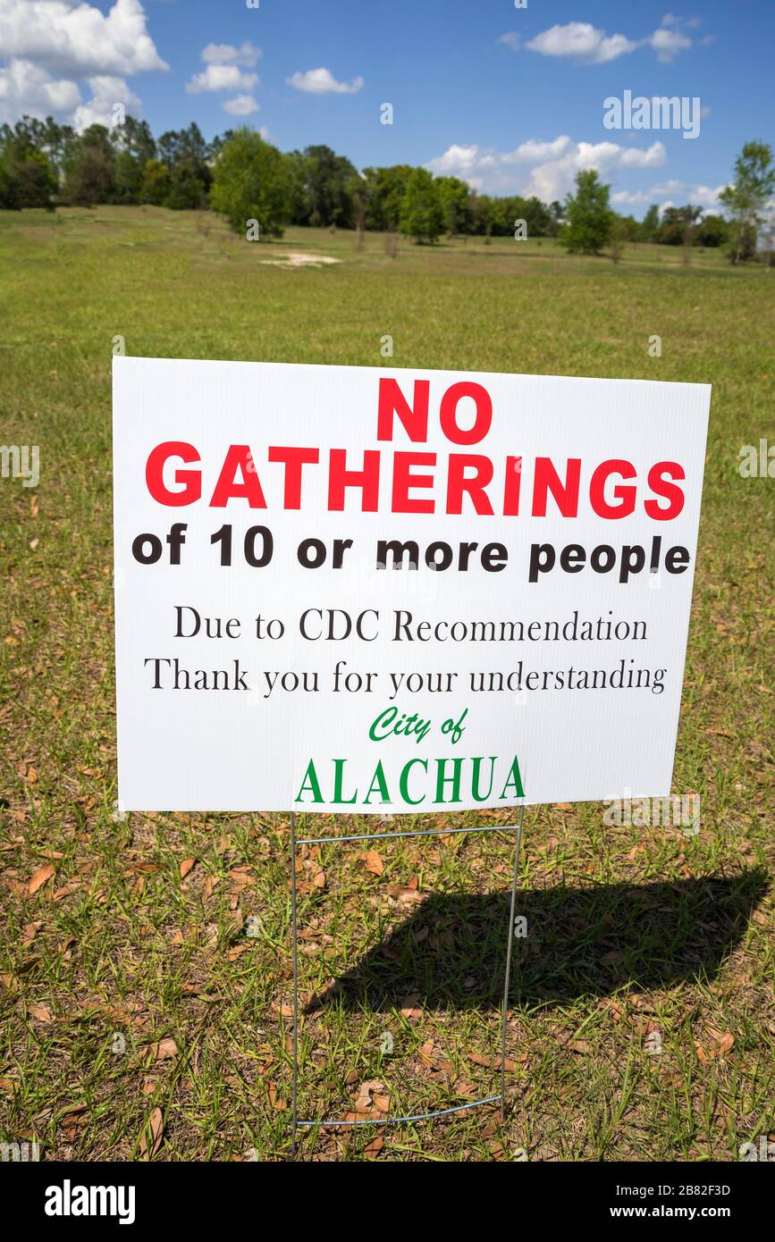 Restricted gathering of people sign at a public park in Alachua, Florida, due to the coronavirus threat. Stock Photo