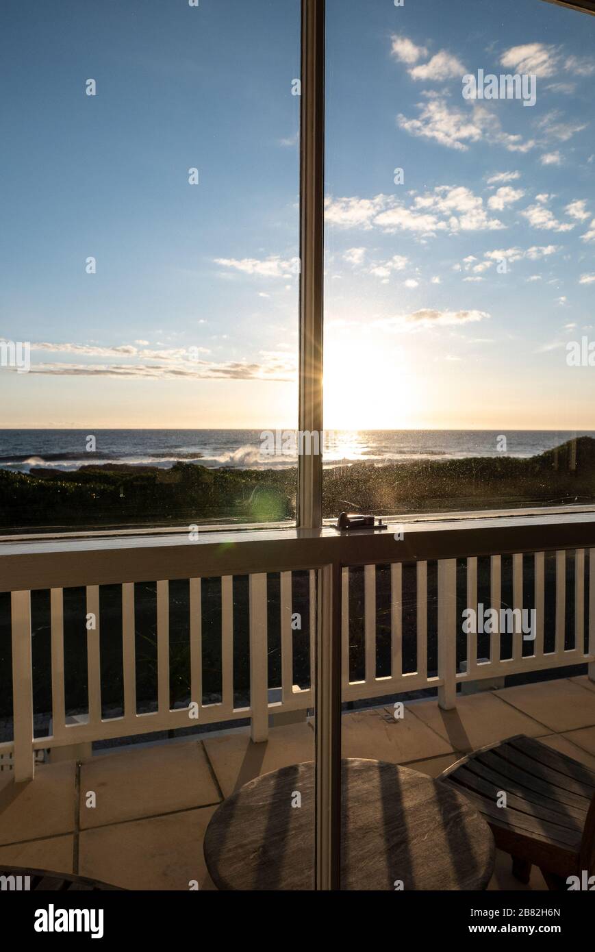 Balcony overlooking Beach at Sunset, Hermanus, Garden Route, South Africa Stock Photo