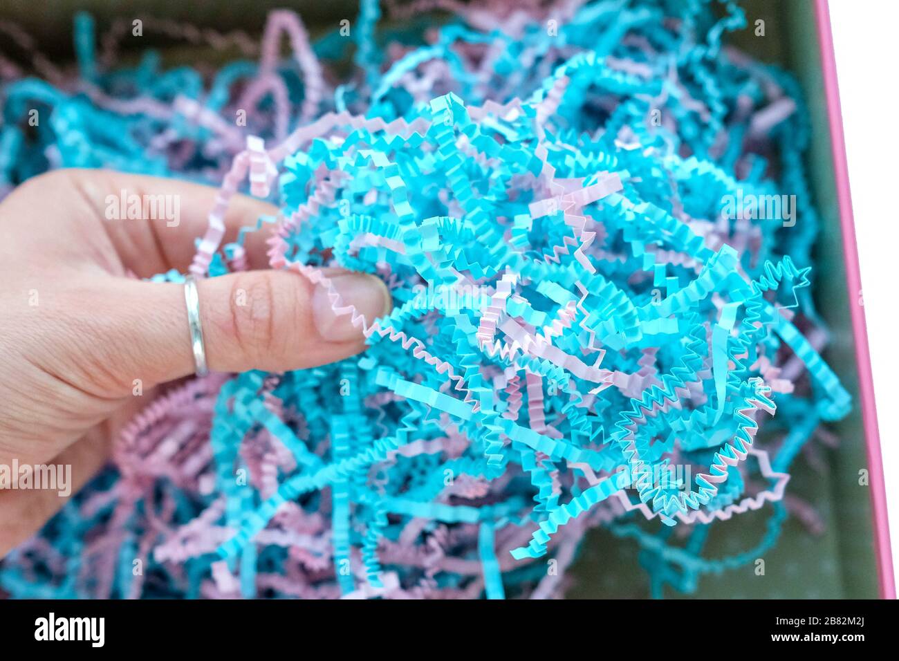 Paper shavings. Colored cut paper for packaging. Stock Photo