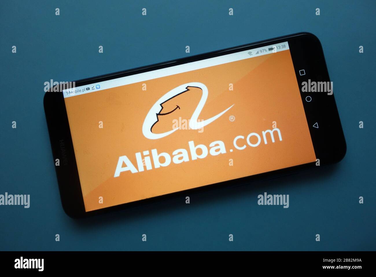 Alibaba.com logo displayed on smartphone Stock Photo