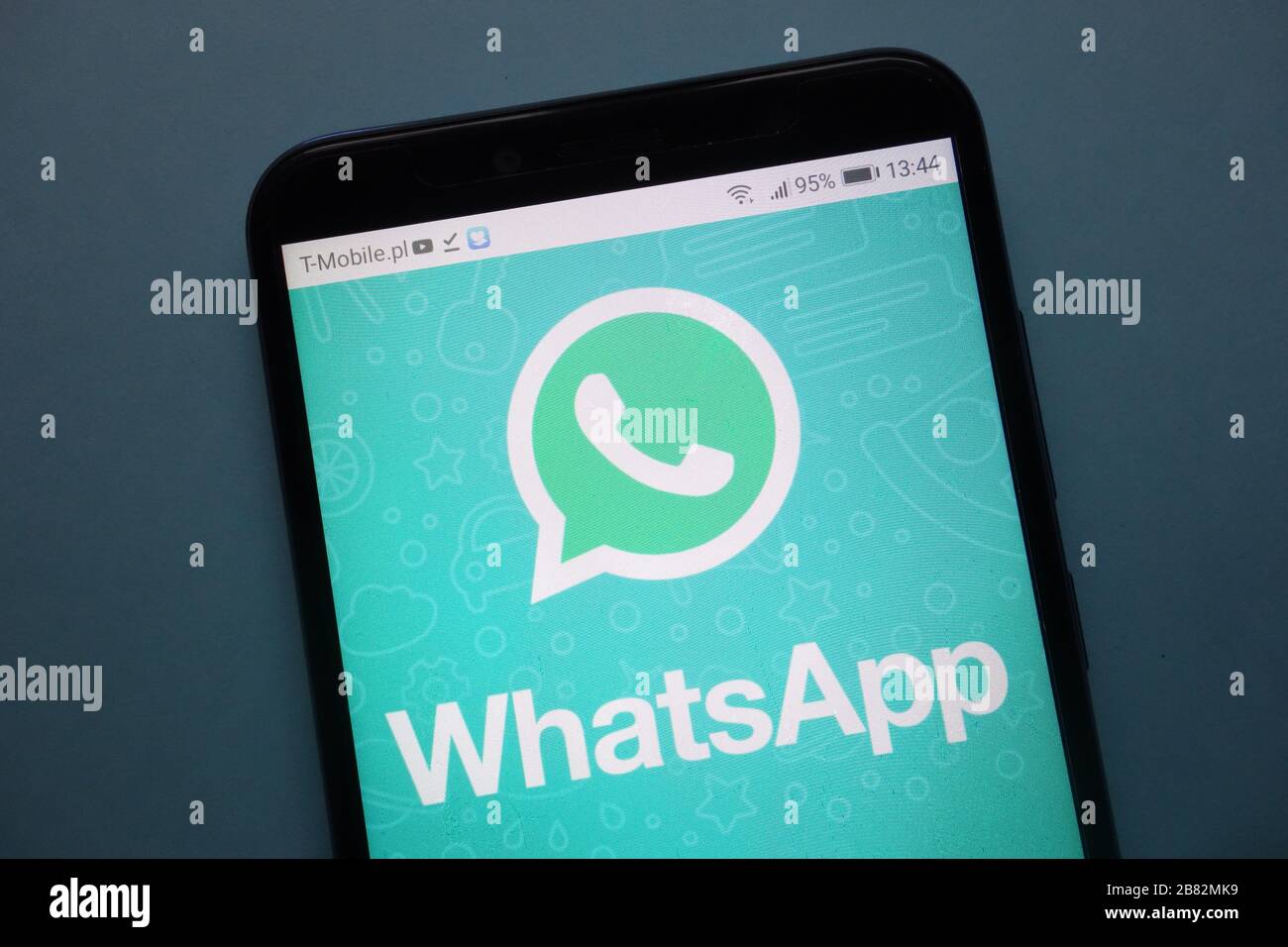 WhatsApp Messenger logo displayed on smartphone Stock Photo