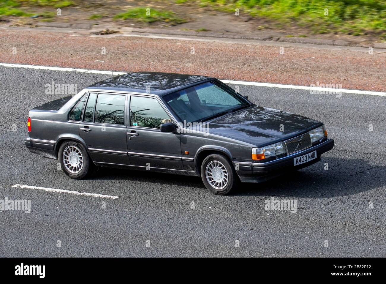 1993 grey Volvo 960 24V Auto  UK vehicular traffic, transport, moving vehicles, vehicle, roads, motors, motoring  on the M6 motorway highway Stock Photo