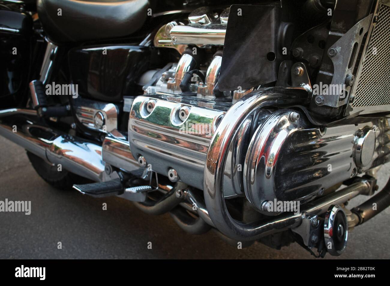 Close-up of a six-cylinder internal combustion engine of a motorcycle Stock Photo
