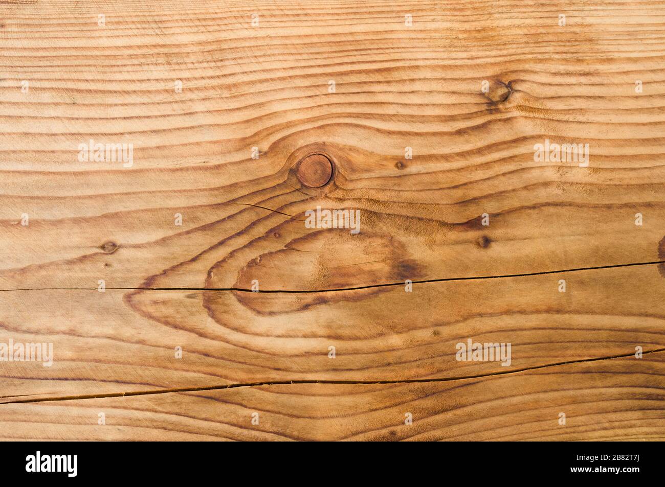 brown wood texture background with old knots and cracks Stock Photo