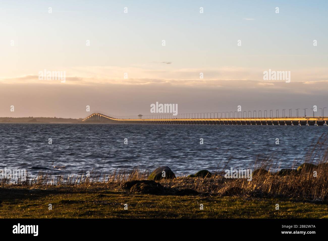 The Oland Bridge in evening sunshine - connecting the island Oland with mainland Sweden Stock Photo