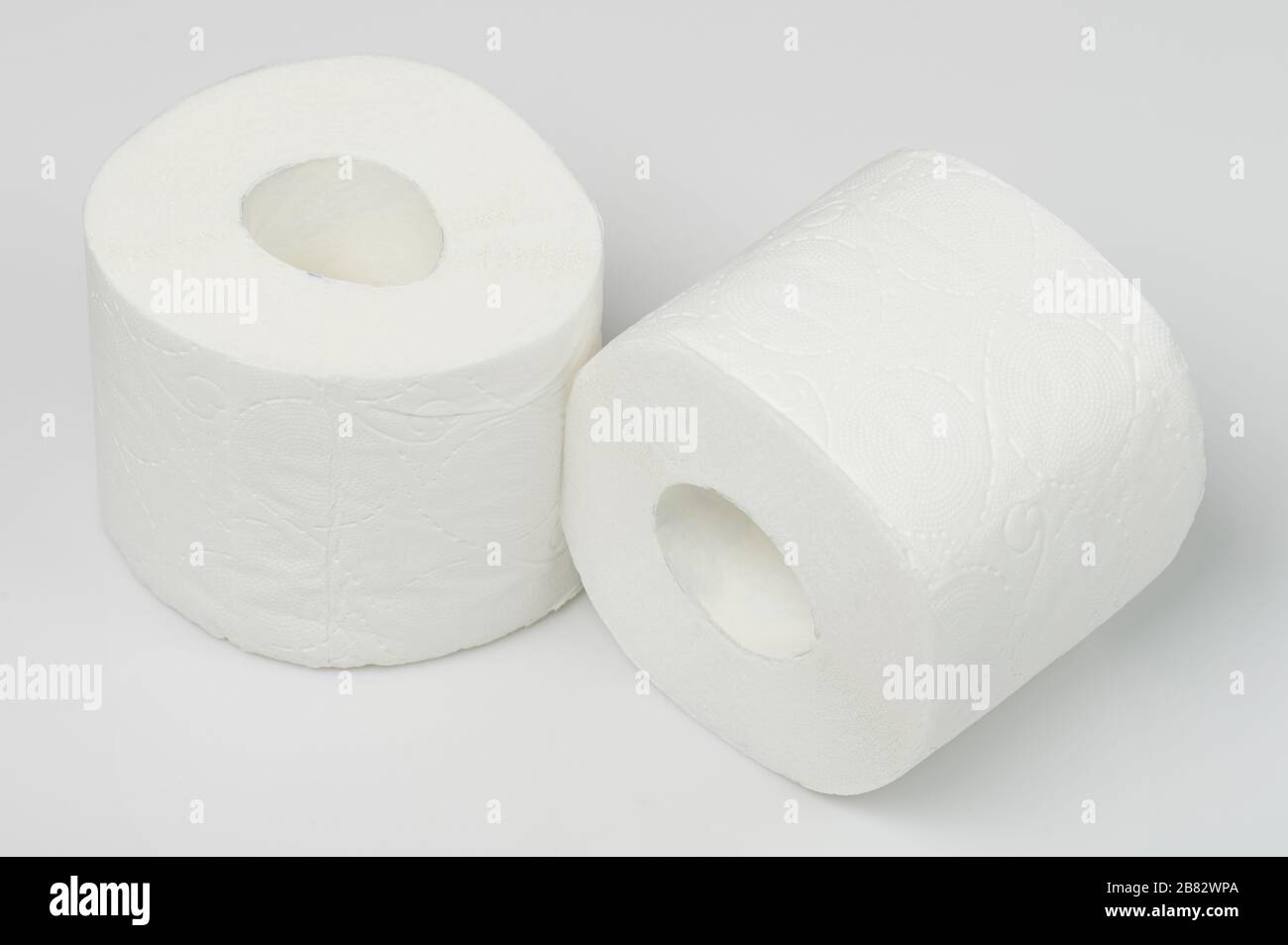 Two rolls of toilet paper isolated on white studio background Stock Photo