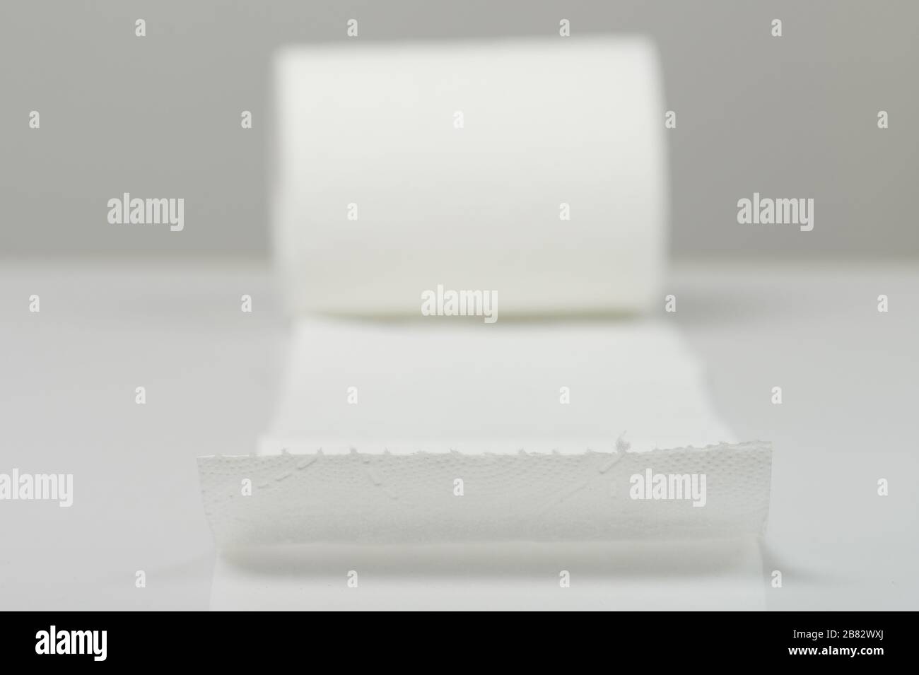 Edge of white soft toilet paper clsoe up view Stock Photo