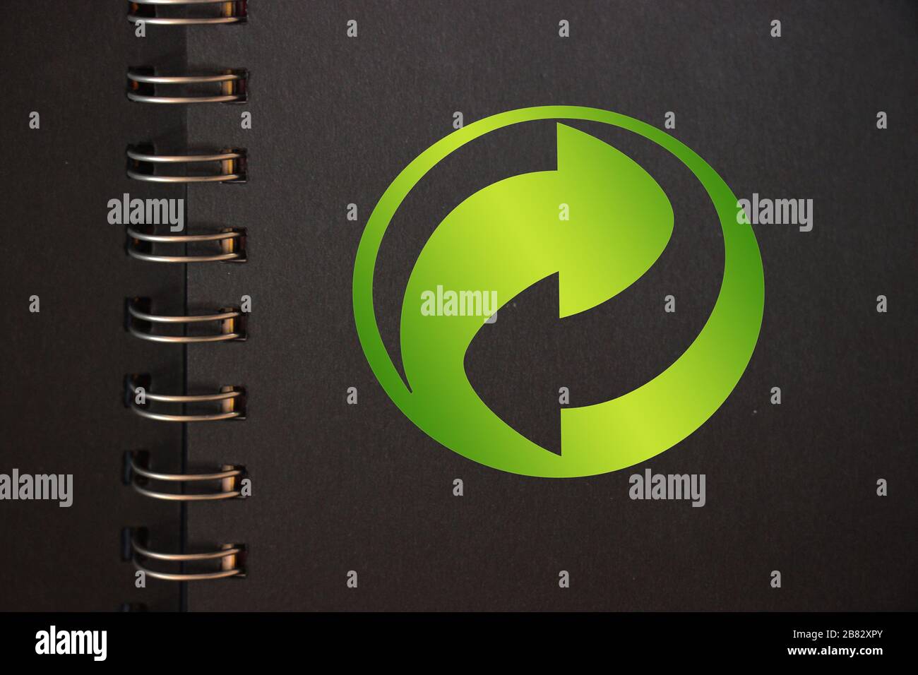 Conceptual recycling reusing sign in black copybook. Reduce reuse ...