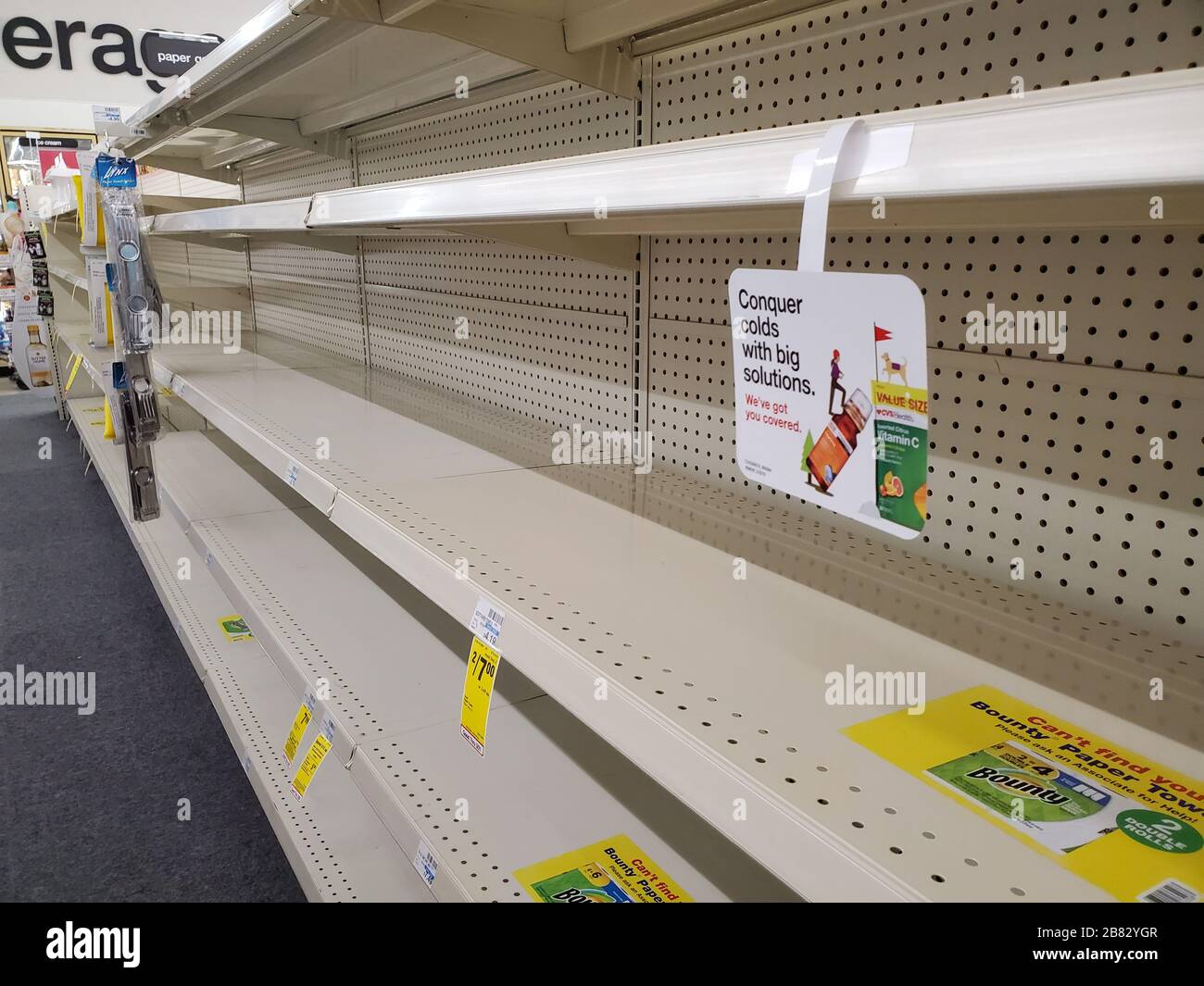 Following the announcement of a shelter in place order for the San Francisco Bay Area, shelves previously containing paper products were base at a pharmacy in Contra Costa County, San Ramon, California during an outbreak of the COVID-19 coronavirus, March 16, 2020. () Stock Photo
