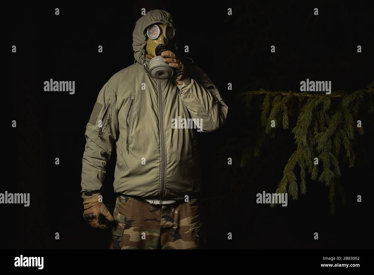 man in a gas mask protects himself from coronavirus Stock Photo