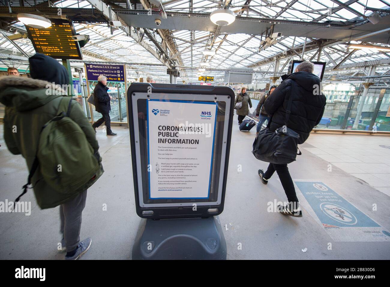 Edinburgh, UK. 19th Mar, 2020. Pictured: Public information sign in Waverley Station. Waverley Station during rush hour during the Coronavirus Pandemic. What would normally be hustle and bustle packed with commuters trying to get home, a more or less empty concourse. Credit: Colin Fisher/Alamy Live News Stock Photo