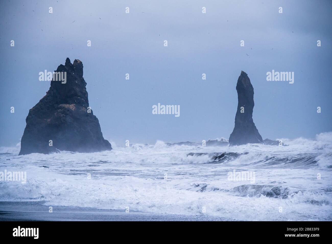 The cliffs off the shore of Reynisfjara. Stock Photo