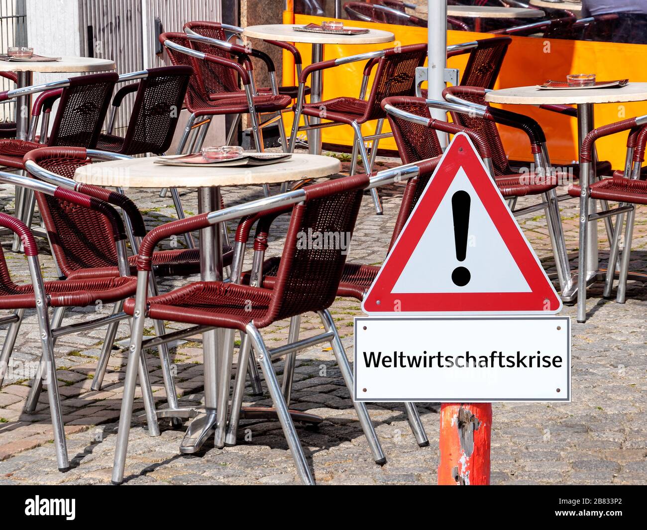 Great Depression Warning Sign Empty Cafe in german Stock Photo