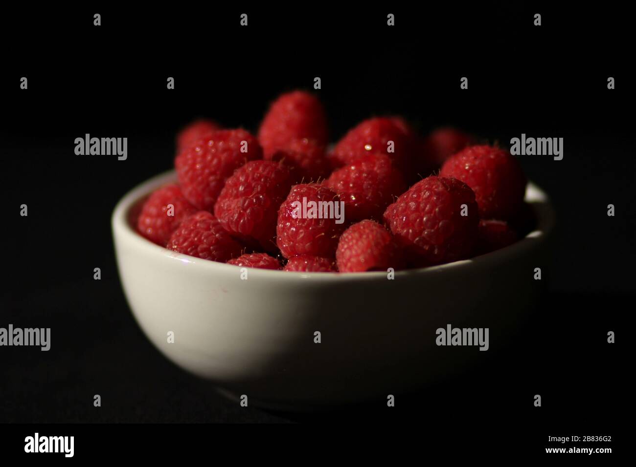 High Contrast Raspberries Stock Photo