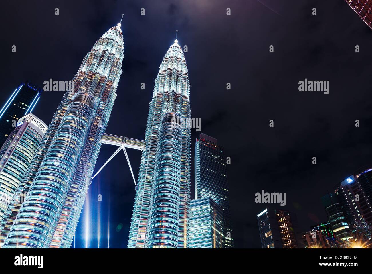 Kuala Lumpur, Malaysia - November 28, 2019: Petronas Twin Towers at night, skyline of KLCC park Stock Photo
