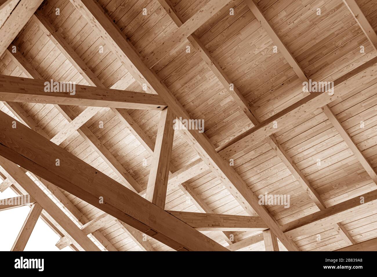 The construction of the wooden roof. Stock Photo