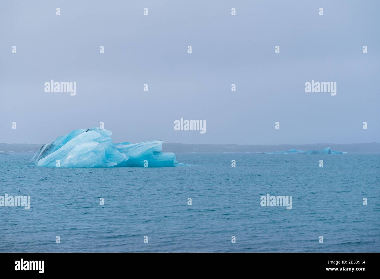 Iceberg floating on its own at Jökulsárlón. Stock Photo