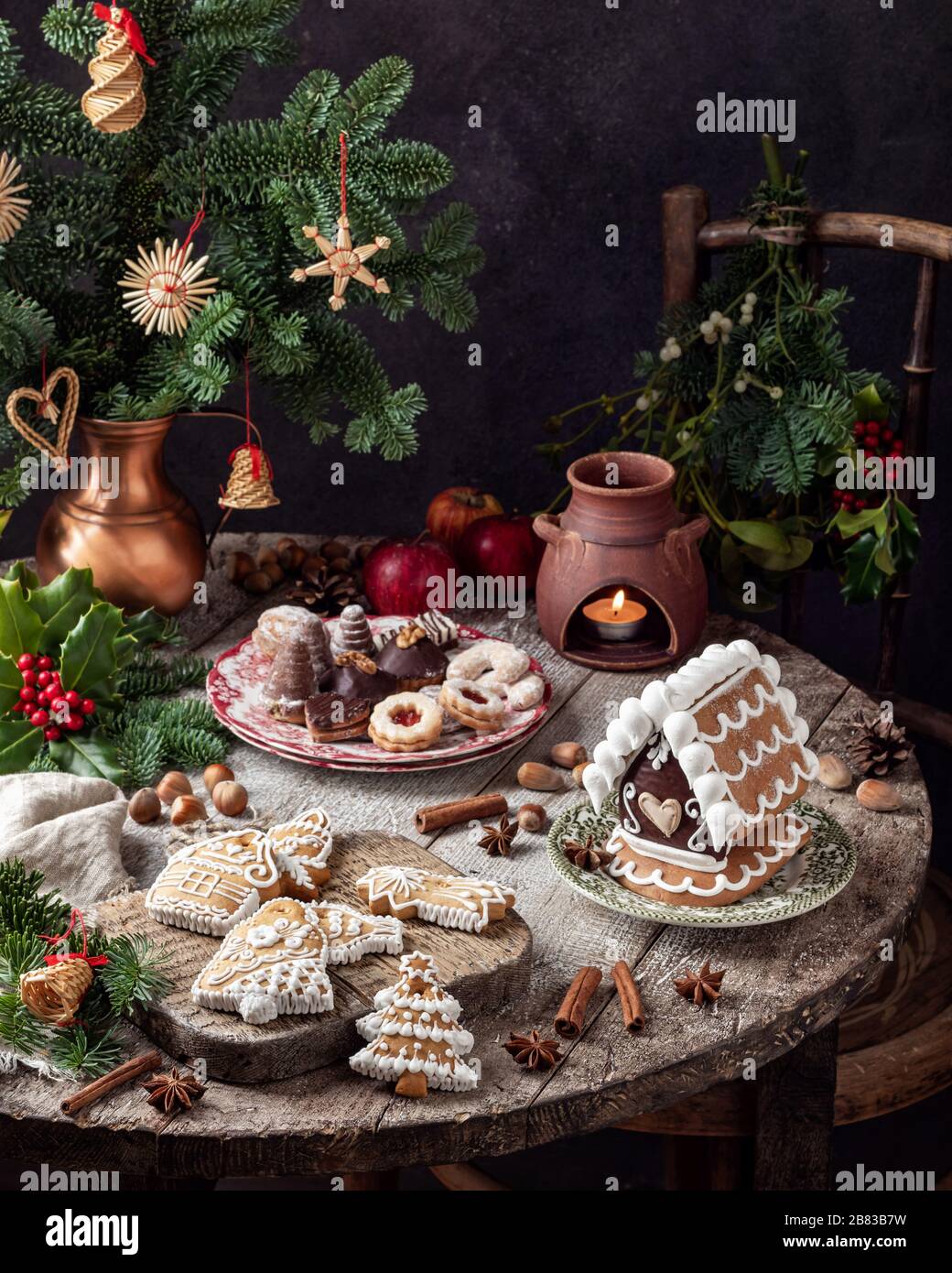 Gingerbread and other Christmas cookies on a rustic table Stock Photo