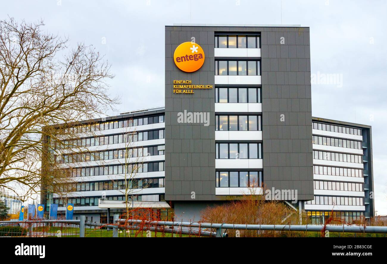 Office building with the Entega logo and a text reading 'Climate Friendly Simply for All'. Entega AG is a German energy supplier based in Darmstadt. Stock Photo