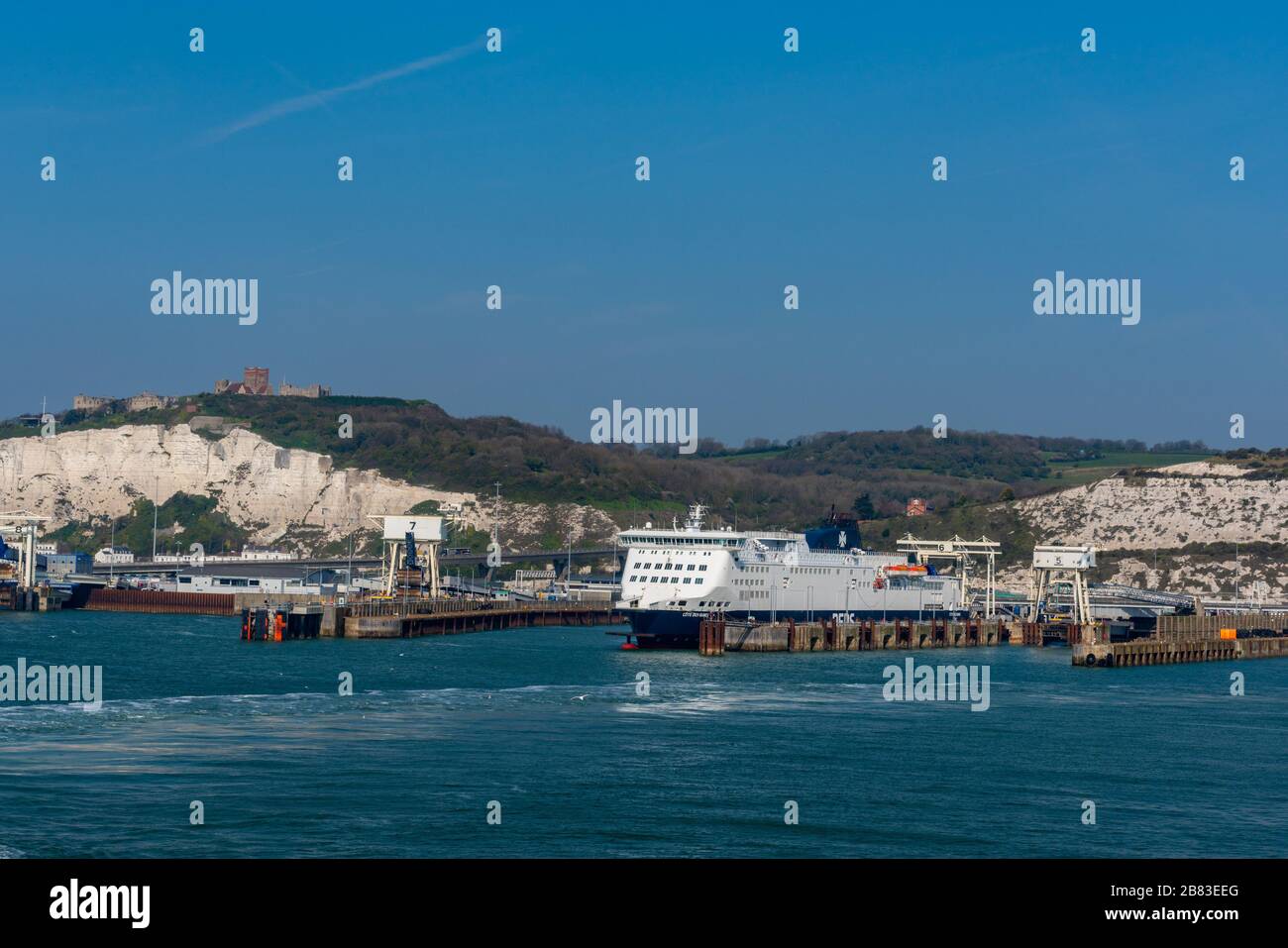 DFDS Ferry Cotes Des Dunes at Dover Eastern Docks with Dover Castle beyond Stock Photo