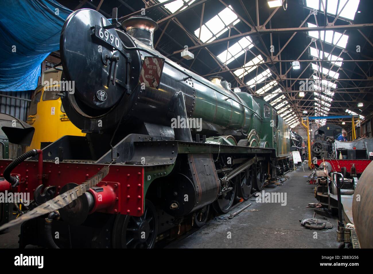 “Witherslack Hall” Modified Hall Class, 4-6-0, steam engine number 6990, built in 1948.Great Central Railway, Loughborough, Leicestershire, England Stock Photo