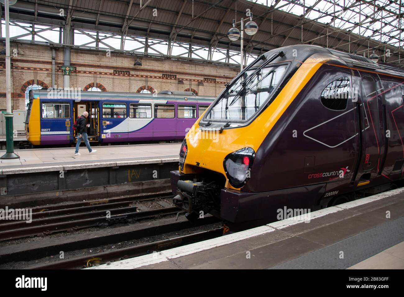 Arriva Class 220 Voyager diesel-electric high-speed multiple-unit train at Piccadilly Station, Manchester, England. Northern Trains train behind. Stock Photo