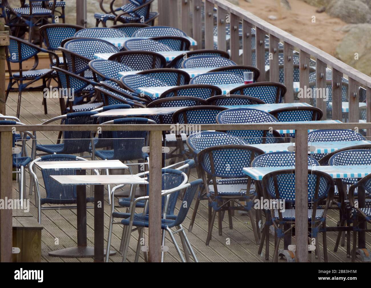 UK Weather, 19th March 2020. UK Fistral beach Newquay Cornwall. bars cafes and amusement arcades left deserted as public heed advice to stay away. Cre Stock Photo