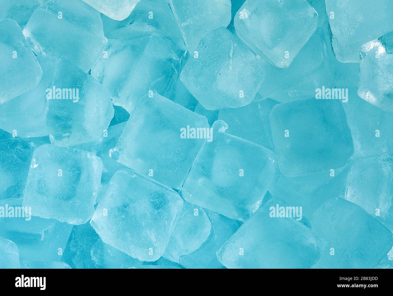 Freezing blue ice cubes Stock Photo Alamy