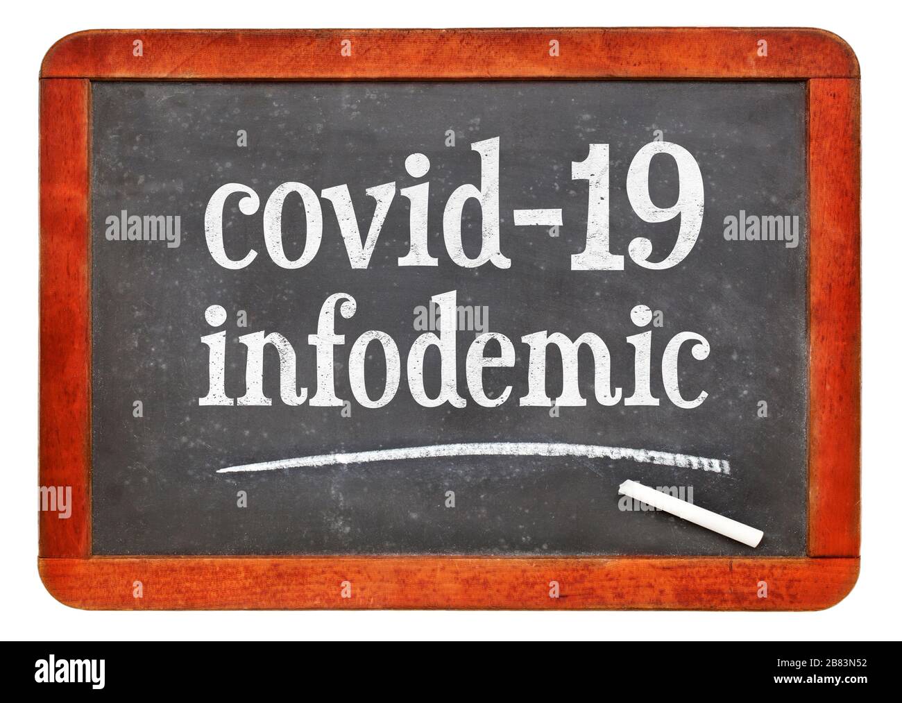 covid-19 infodemic - coronavirus pandemic information overload concept, white chalk text on a vintage slate blackboard Stock Photo