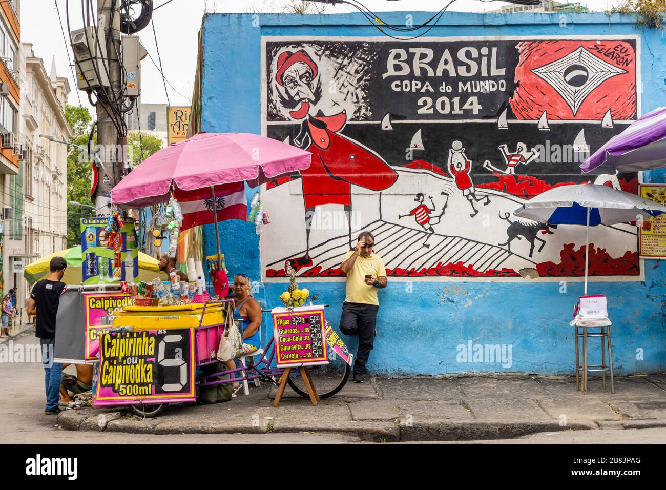 Stalls at te foot of the Escadaria Selaron (Selaron Steps) created by artist Jorge Selaron and Brazil Wold Cup mural, Rio de Janeiro, Brazil Stock Photo
