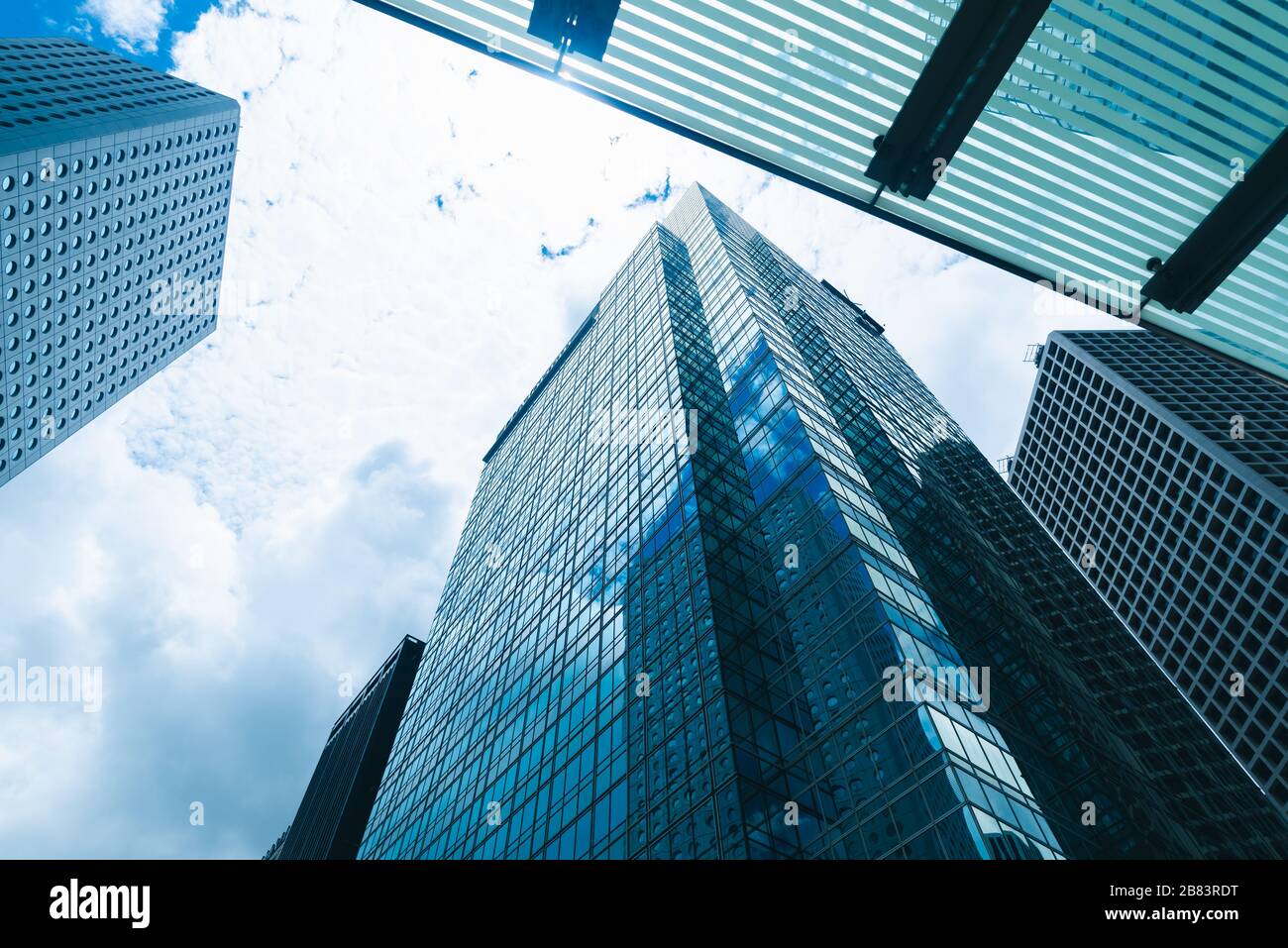 skyscraper building in Hong Kong, city view in blue filter Stock Photo ...