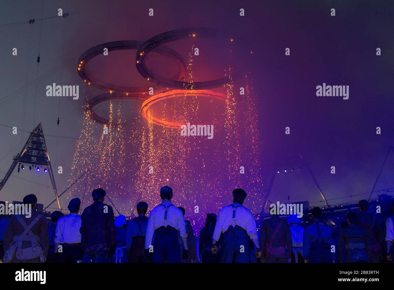 Performers in London 2012 Stratford Olympic Stadium looking at Olympics