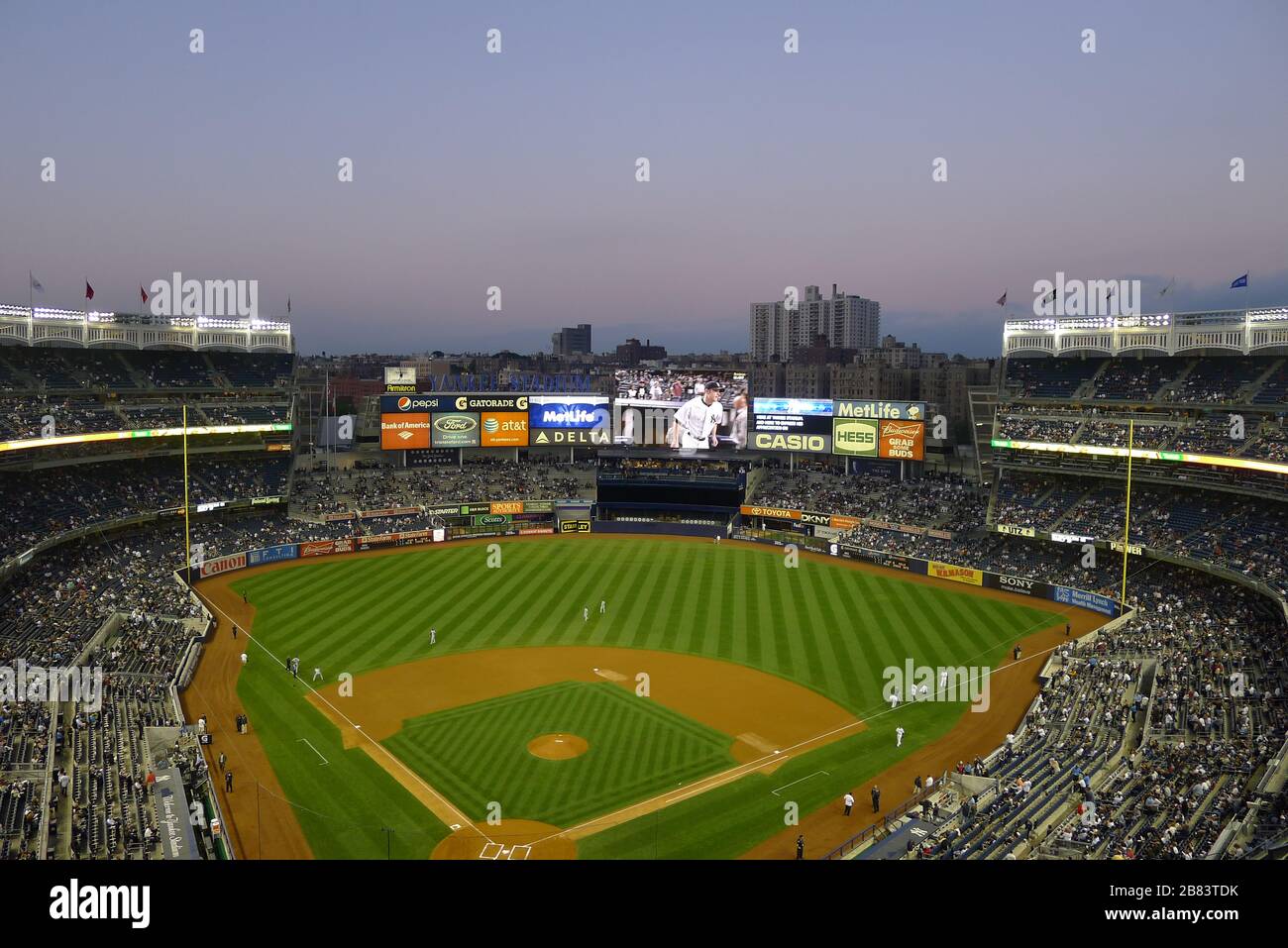 American baseball fans watching game at New York Yankees Stadium Stock