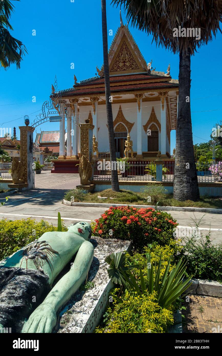 Battambang, Cambodia, Asia: sculpture in front of the pagoda of the temple Wat Tahm rai saw Stock Photo