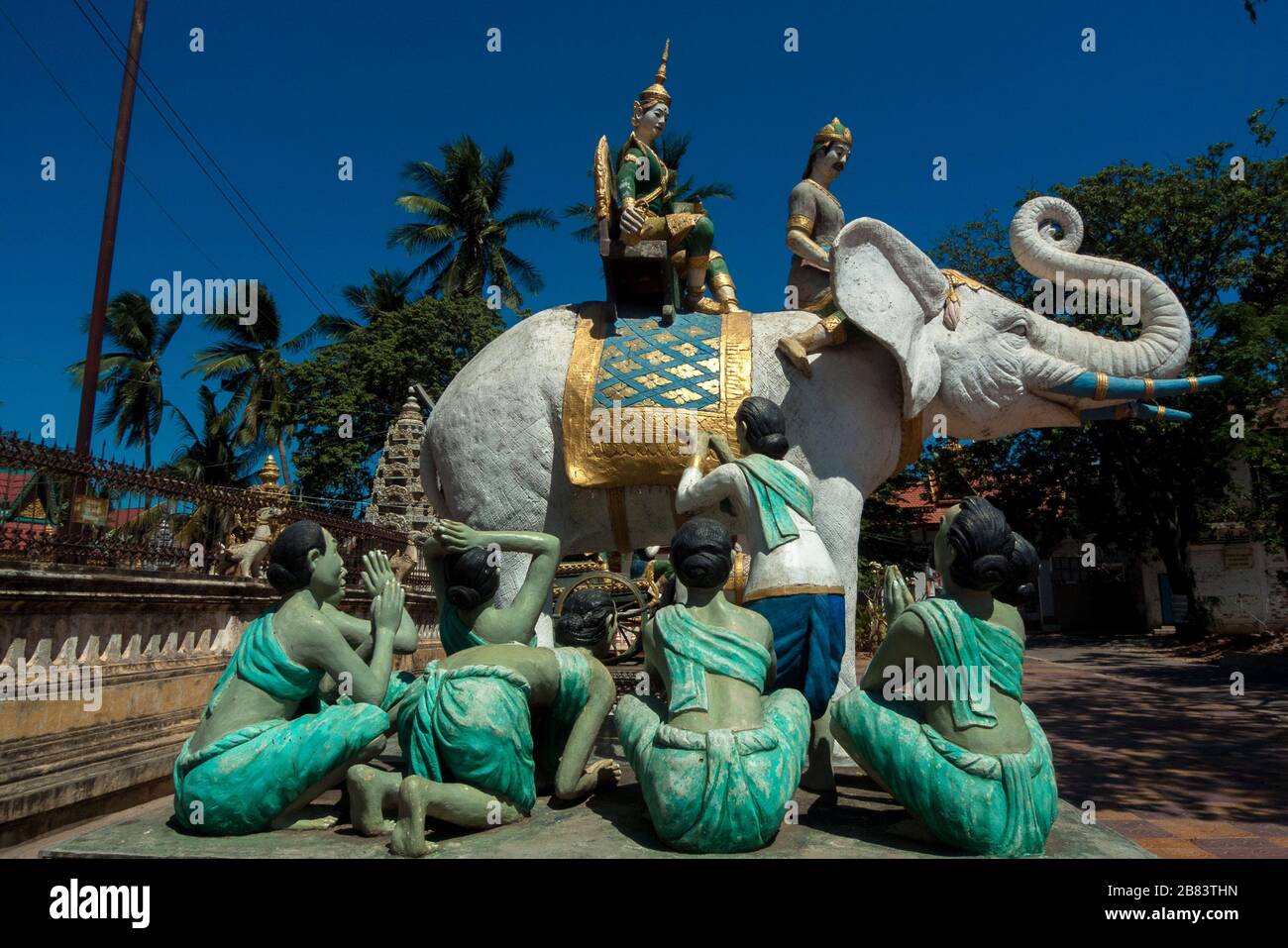 Battambang, Cambodia, Asia: sculpture of the white elephant with group of devotees in the Wat Tahm rai saw temple Stock Photo