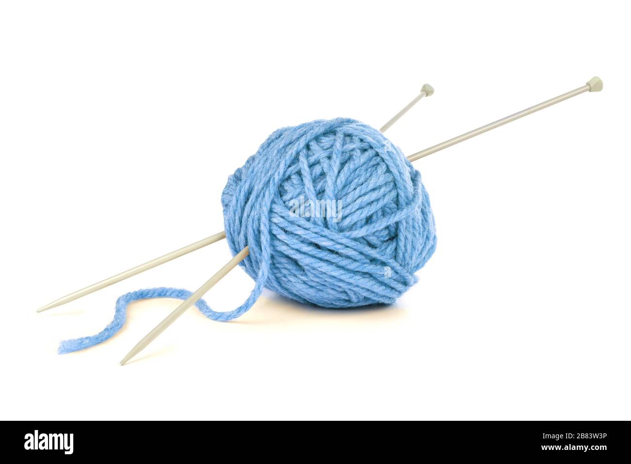 ball of yarn with knitting needles