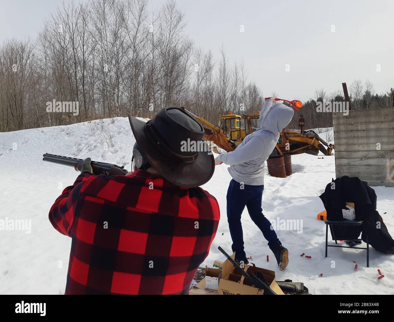 Men shooting clay targets at balltrap, shooting range Stock Photo Alamy