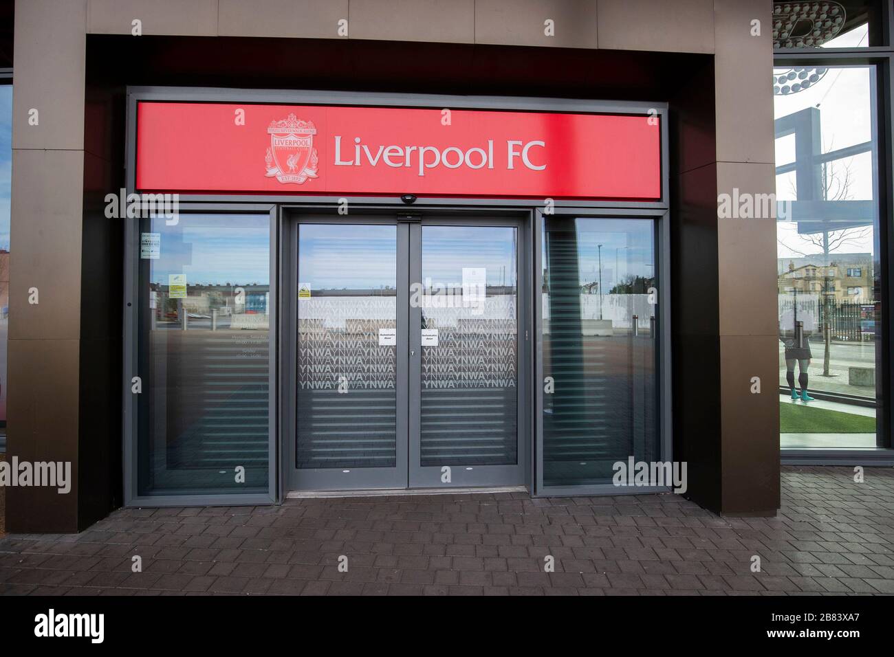 A general view of the closed club shop at Anfield, home of Liverpool Football Club, after it was announced that Professional football in England will Stock Photo