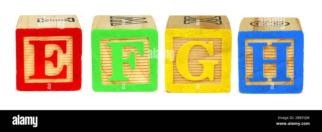 E F G H wooden toy letter blocks isolated on white Stock Photo