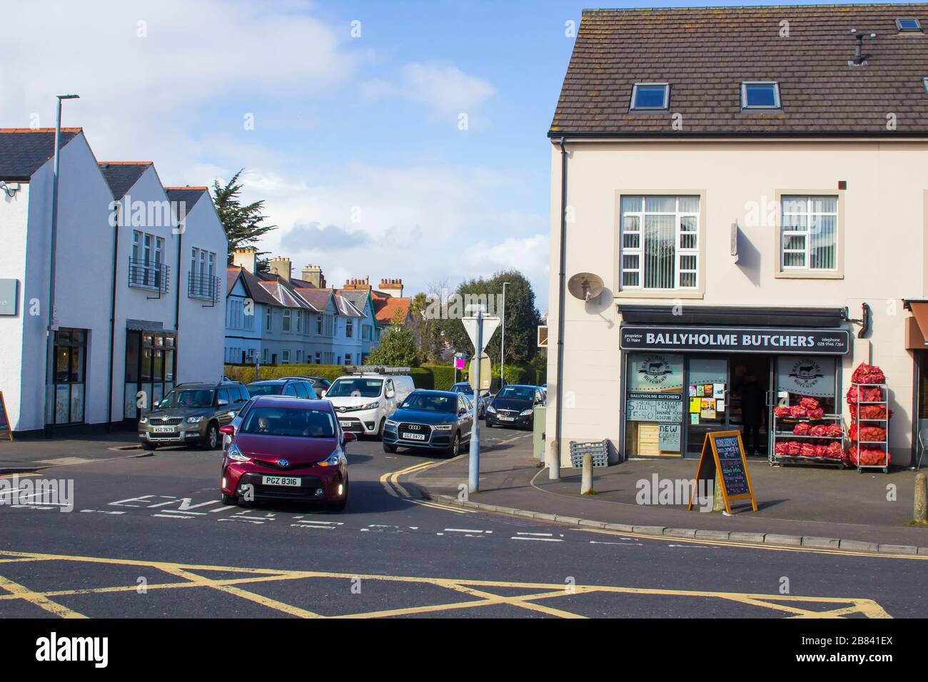 19 March 2020 Road traffic in the Ballyholme Village area on the Groomsport Road Bangor County Down Northern Ireland on a bright afternoon in spring Stock Photo