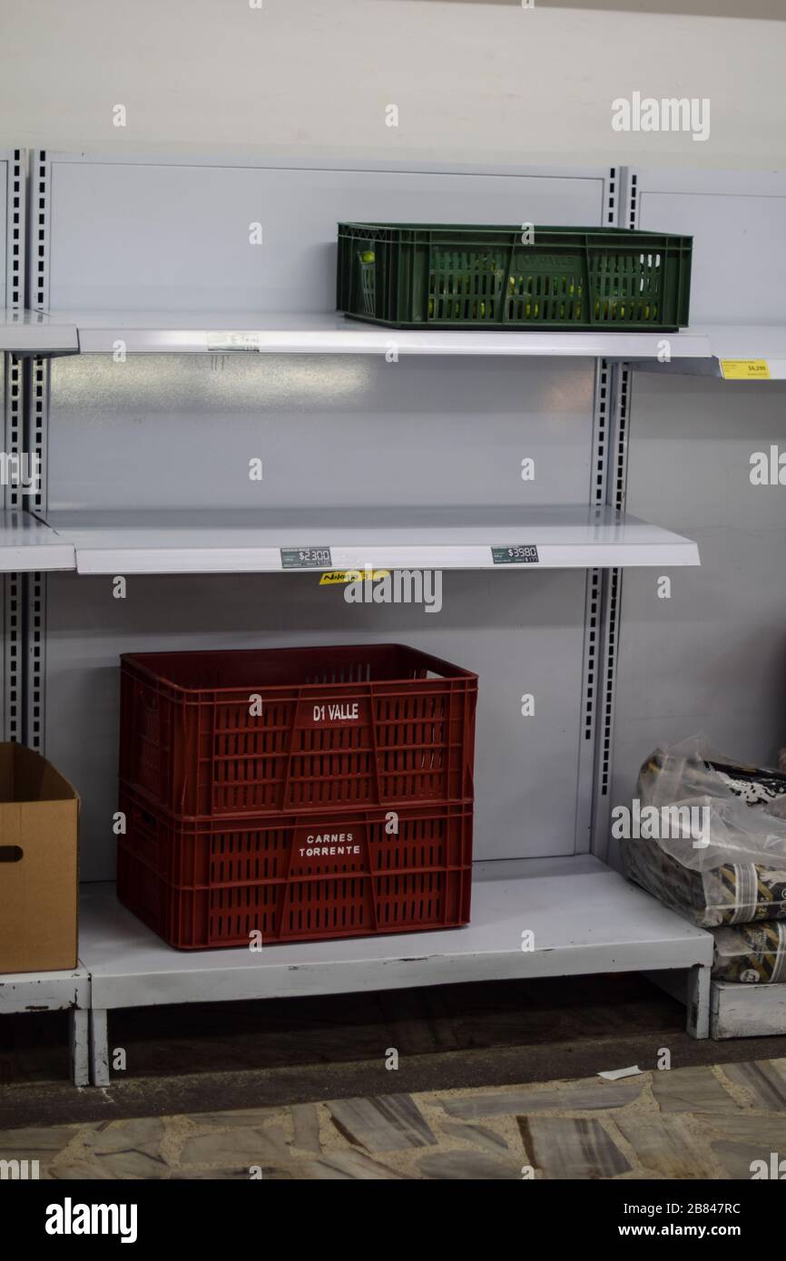 Empty shelves  in supermarket, a day before the first lockdown in Colombia due to Coronavirus Stock Photo