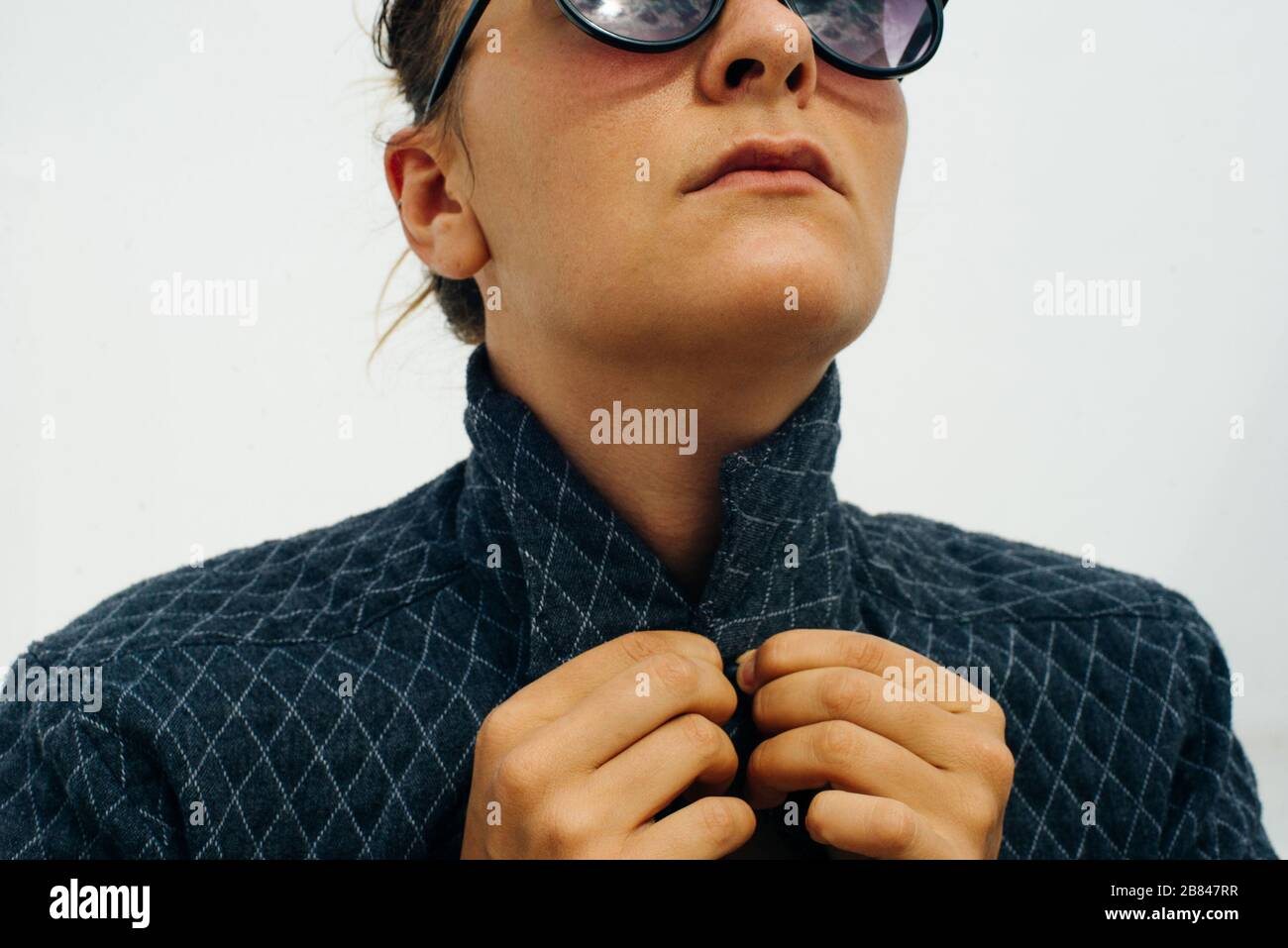 portrait girl in sunglasses on a white background Stock Photo - Alamy