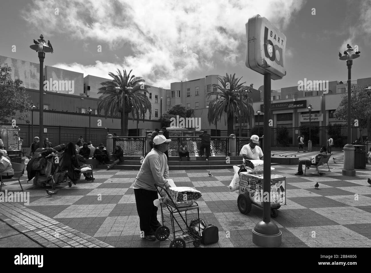 Churro vendors in a park at the Bay Area Rapid Transit (BART) station at 16th and Mission Streets, San Francisco, California, United States Stock Photo